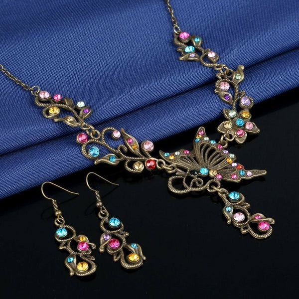 Complete Your Look: A Retro Butterfly & Flower Crystal Jewelry Set (Necklace & Earrings)